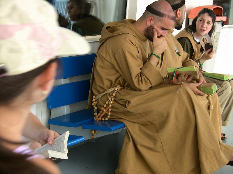 IMG_0586.jpg - READING A HOLY BOOK